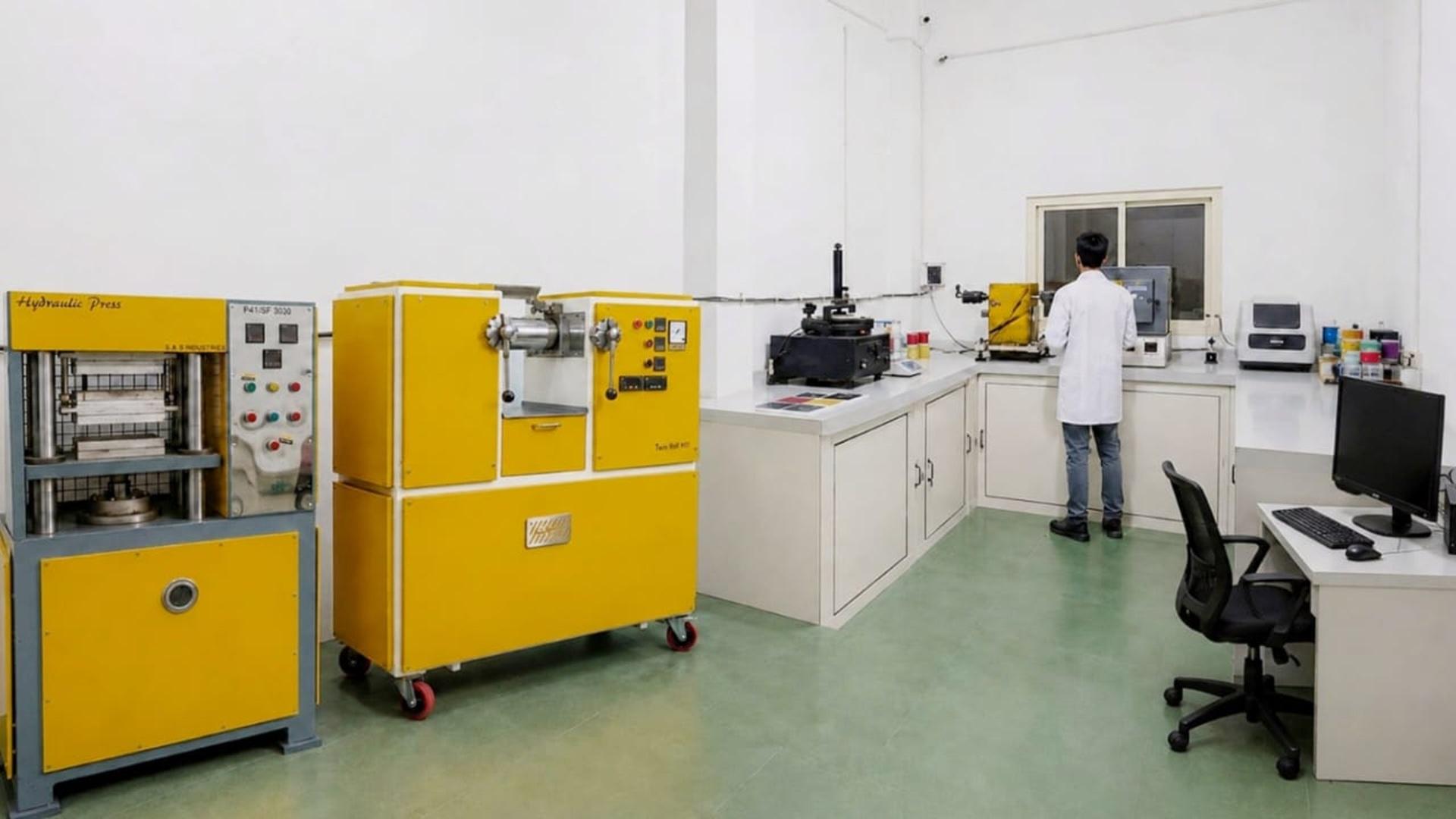 Manali Pigments quality control laboratory with technicians performing application and testing analysis for color consistency