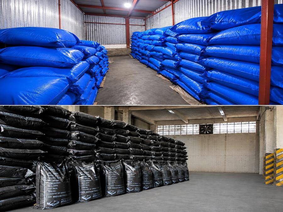 Organized pigment storage facility with packed consignments ensuring batch traceability and reliable global export